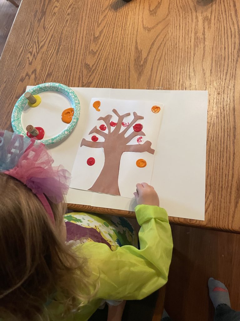 V creating a tree with fall leaves