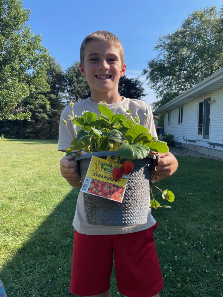 JT and the Strawberry Plant